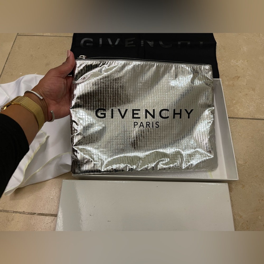 Givenchy silver clutch. Brand new.